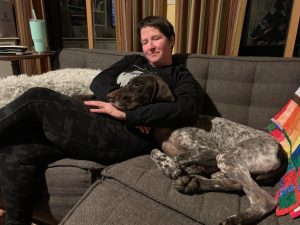 Healthy Rover pups relaxing with Heather